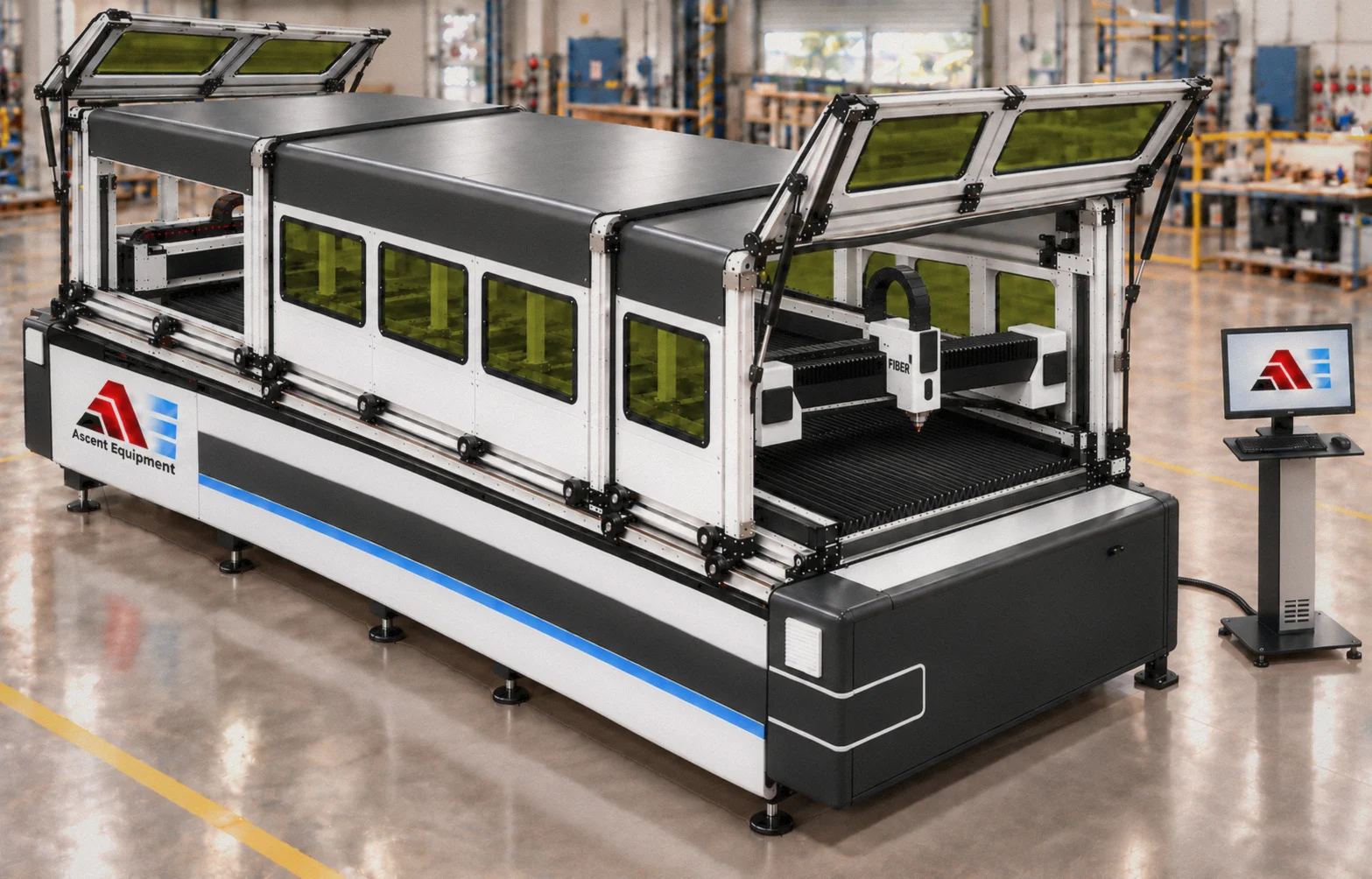 Dual gantry CO2 and fiber laser cutter with sliding covers, green viewing windows, raised access doors and a separate operator console on a factory floor