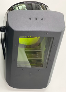 Laser welding helmet with a dark gray shield and a green-tinted laser protection window